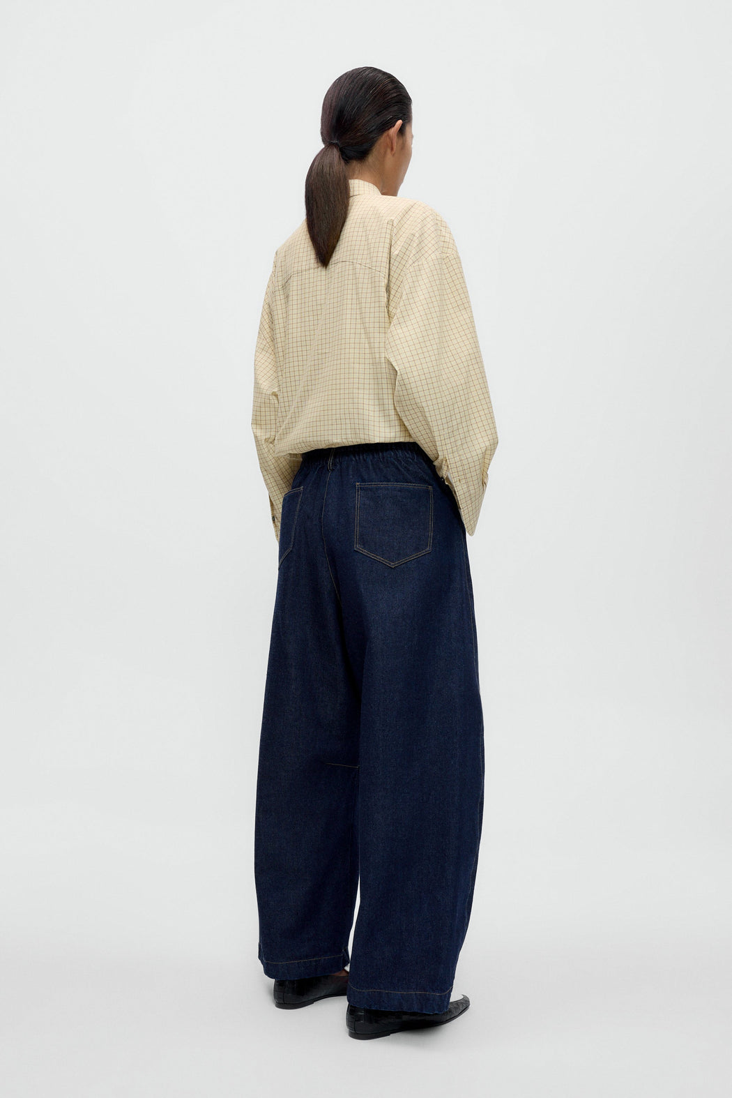 CURVED BAGGY JEANS | INDIGO